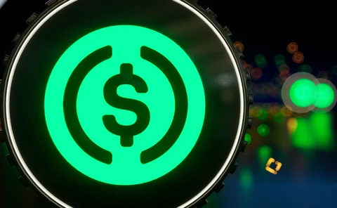 USD coin symbol in green neon