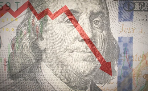 A dollar note with a downward pointing arrow overlaid