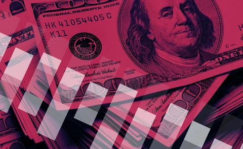Dollar notes overlaid with a financial bar chart